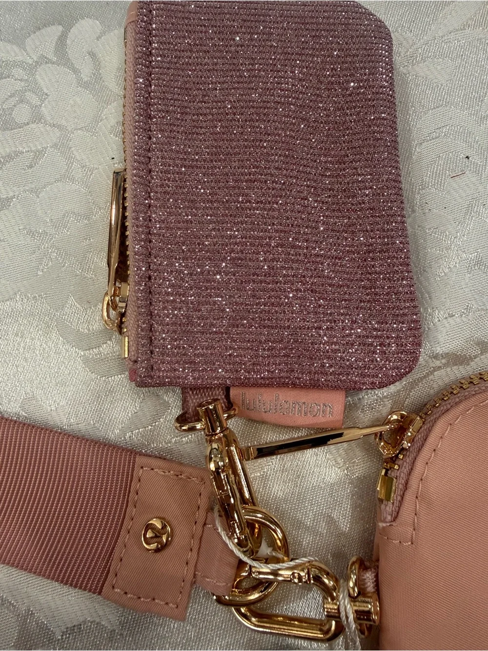 Women’s Pink Sparkle duel Pouch wristlet - Brand: lululemon